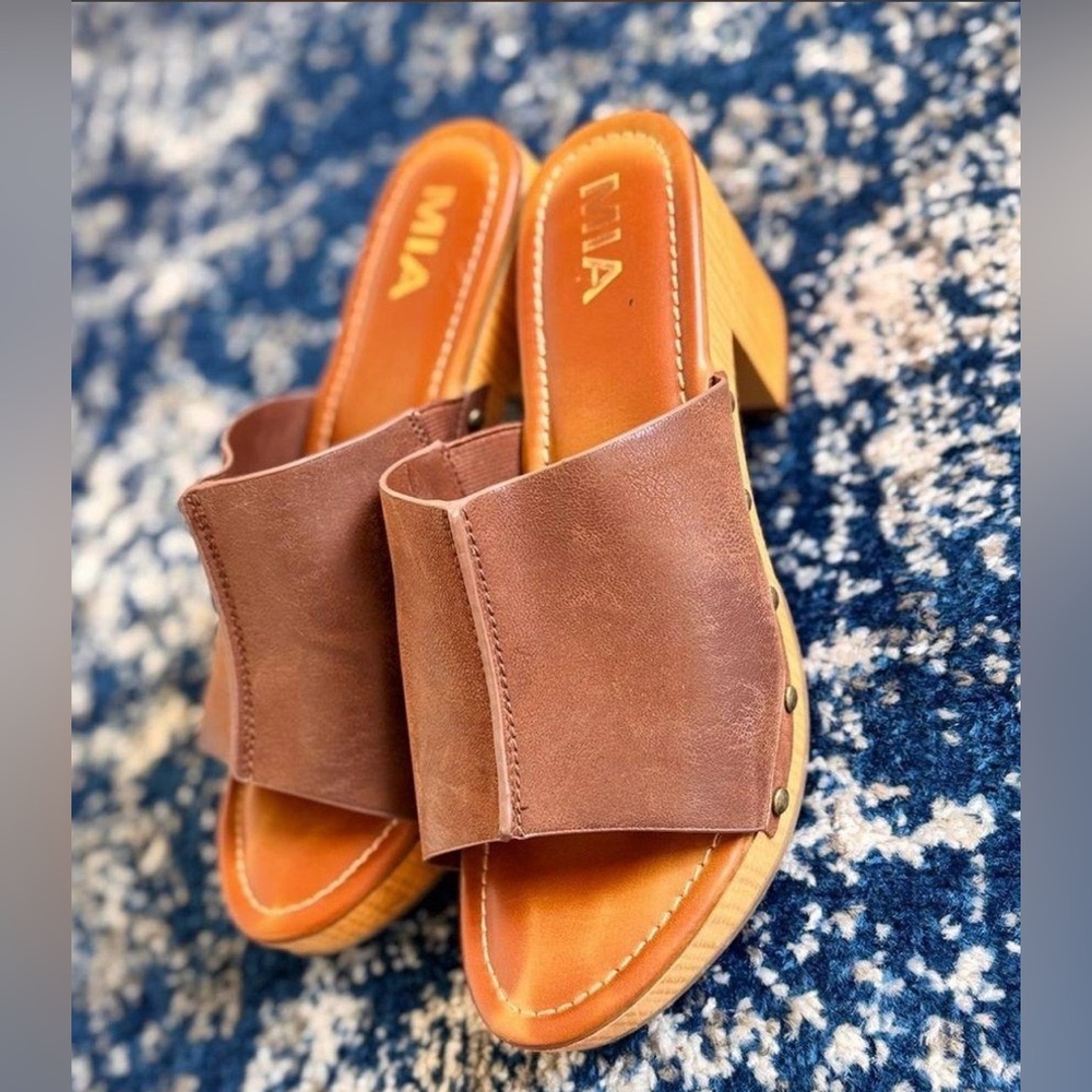 MIA chic brown leather wooden clogs.Size 7.5